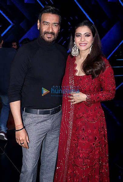 Devgn with his wife Kajol at an event in 2020