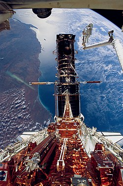 Astronauts Musgrave and Hoffman during final STS-61 EVA (28127832695).jpg