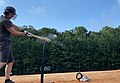 Baseball bat uses a charge to launch the ball.jpg