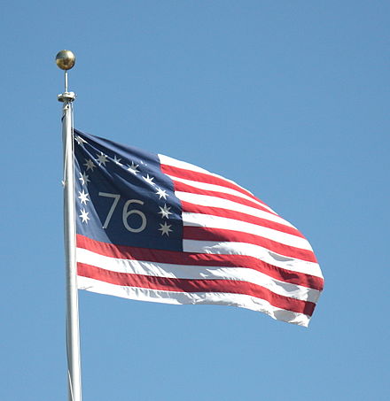 A replica of the flag flying outside San Francisco City Hall