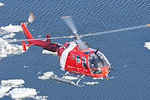 A Canadian Coast Guard MBB Bo 105 over St. Lawrence River near Quebec City