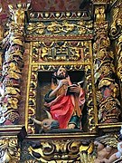 Talla de San Lucas en el retablo de San Juan.