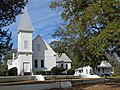 Miniatura para Iglesia cristiana y casa parroquial