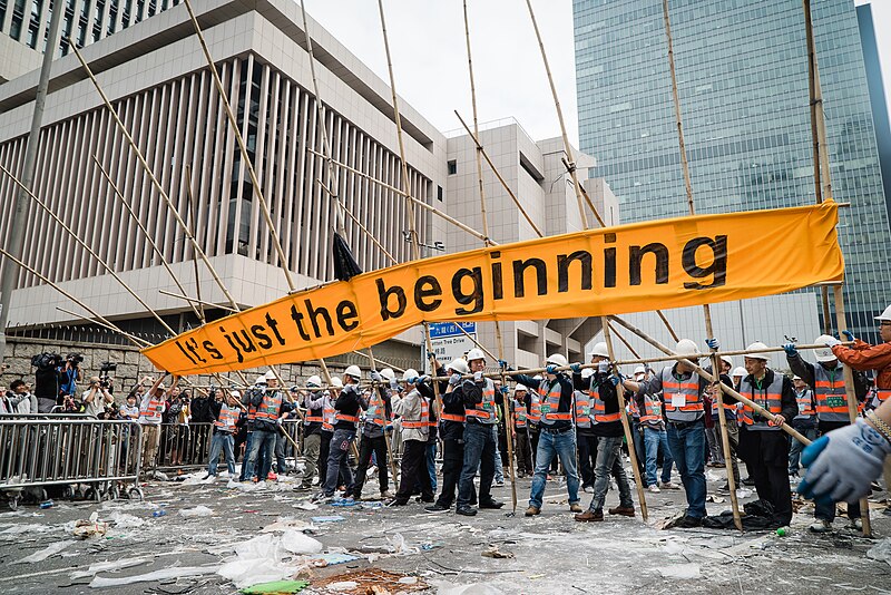 File:Cleaning Roadblocks at Connaught Road Central 20141211.jpg