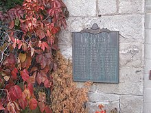 Daughters of the Utah Pioneers Plaque, located at the base of the Mill's tower Cottonwood Mill Sign.jpg