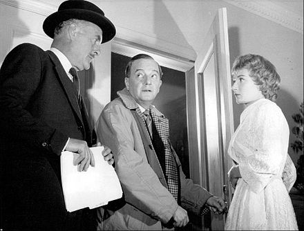 A production of Dial M for Murder, L–R: John Williams, Maurice Evans, and Rosemary Harris (1958)