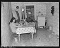 Dining room in home of Manuel Alcala, miner, living in company housing project. National Fuel Company, Monarch Mine... - NARA - 540467.jpg