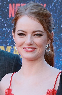 A picture of Emma Stone as she looks at the camera.