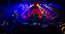 Former members performing in Costa Rica for the parallel Rhapsody farewell tour