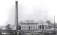 The depot complex c. 1910. The Glossop Brook iron bridge appears in the foreground.