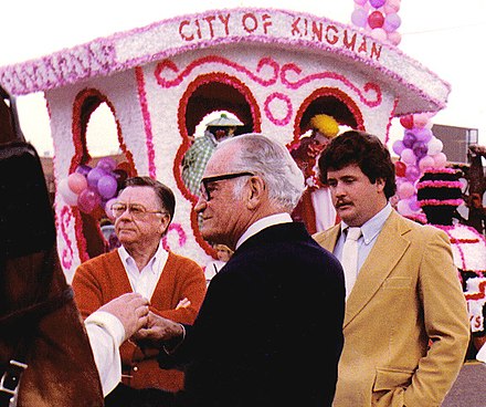 Signing autographs at the Fiesta Bowl parade in 1983