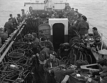 Infantrymen of the Highland Light Infantry of Canada aboard a landing craft en route to France on D-Day. LCI(L) 306th of the 2nd Canadian (262nd RN) Flotilla HighlandLightInfantryOfCanadaInLandingCraftDday.jpg