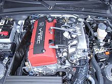 F20C engine of the Honda S2000 in left hand drive specification (battery on the right side of the engine) Honda-S2000-JDM-F20C.JPG