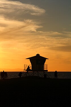 Lifeguard Tower at Sunset at Huntington Beach, CA.