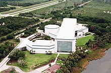 Aerial view of the Apollo/Saturn V Center from 1998 KSC Visitor Complex Saturn V Center 1998.jpg