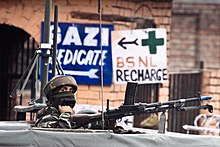 A soldier guards the roadside checkpoint outside Srinagar International Airport in January 2009. Keeping Watch.jpg