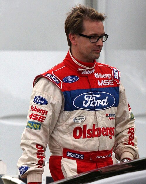 Kenny Bräck (pictured in 2011) was awarded pole position as the leader of the Drivers' Championship standings.