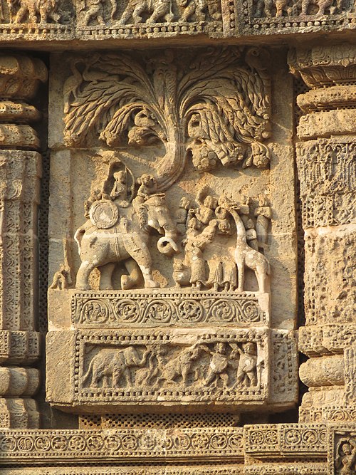 Sculpture at Konark depicting Narasingha Deva I seated atop a war elephant and being presented with a giraffe by some African merchants