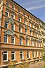 General view of the apartment building in semi-open construction (plaster facade with substantial stucco structures); Gründerzeit apartment building c...