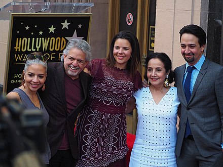 Miranda (right) with his family upon receiving a star on the Hollywood Walk of Fame in 2018. Nadal is in the center.