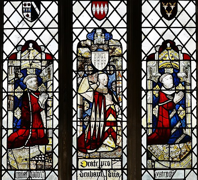 Stained glass window in Long Melford Church in Suffolk, the central figure in which is Elizabeth FitzWalter, 1st wife of John Dinham, 1st Baron Dinham