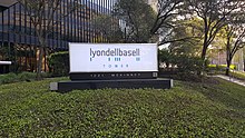 LyondellBasell Tower (formerly One Houston Center) houses the Houston corporate offices of LyondellBasell. Lyondell Houston sign 2018.jpg