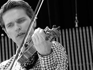 <span class="mw-page-title-main">Mads Tolling</span> Danish-American violinist, violist, and composer