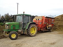 A paddle-type mixer-wagon coupled to a tractor Mixer-wagon.JPG