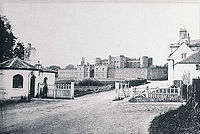 A 19th-century print of Monmouth County Gaol - the tollhouse on the Hereford Road still stands today as does North Parade House which is on the right. Monmouth County Gaol.JPG