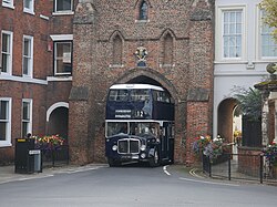 Preserved East Yorkshire 747 passing under Beverley Bar for a third time.