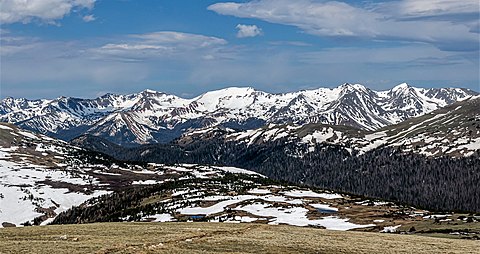Never Summer Mountains viewed from Trail Ridge Road. Left to right: Mt. Nimbus, Mt. Cumulus (centered), Howard Mountain, Mt. Cirrus Never Summer Mountains, Colorado.jpg