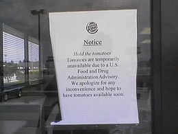 A sign posted at a Havelock, North Carolina Burger King telling customers that no tomatoes are available due to the outbreak. No Tomatoes.jpg