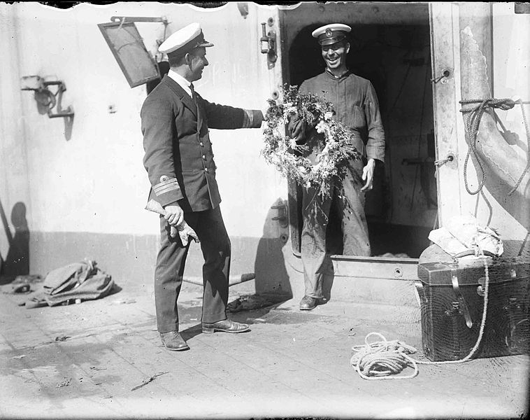 File:Officers with a wreath on HMAS Australia.jpg