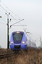 Pågatåg av modellen X61 på premiärtur i Skåne, här i Teckomatorp den 4 december 2009