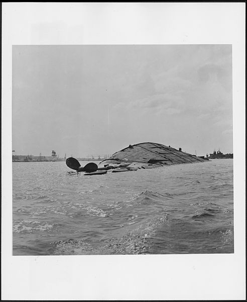 File:Photograph of the USS Oklahoma capsized following the Japanese attack at Pearl Harbor - NARA - 306555.jpg