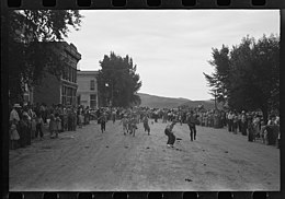 Boys running a potato race in Ridgway, Colorado during a Labour Day celebration in 1940. Potato race Ridgway, Colorado - 1.jpg