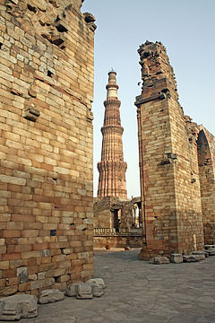 Qutb Minar, a UNESCO World Heritage Site, whose construction was begun by Qutb ud-Din Aibak, the first Sultan of Delhi.