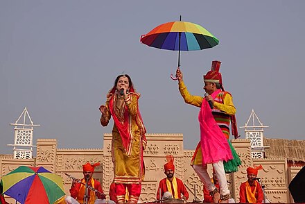 A cultural event at a Kumbh Mela pandal