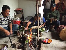 Rai People doing ancestral ritual at "Suptulung" Suptulung is a sacred place where all the Life Cycle cultural ritual activities of Rai community perform Rai people performing ancestoral ritual worship at their Three Hearth Stone of Fireplace of House.jpg
