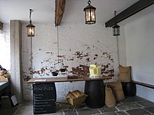 Interior of the shop, now the entrance to the museum Rochdale Pioneers Interior A 29 July 2017.jpg