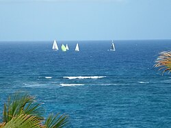 The yachts pass 3 km off shore well clear of the Fathom in the Round Barbados race 2013.