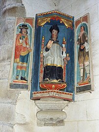 Niche à volets[3] abritant une statue, chapelle de Saint-Herbot en Bretagne (France).