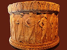 Semi-circular pedestal with gods and heroes, Archaeological Museum of Nicopolis.jpg