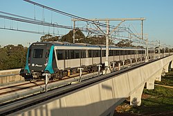 Sydney Metro train approaching Kellyville 01 (2).jpg