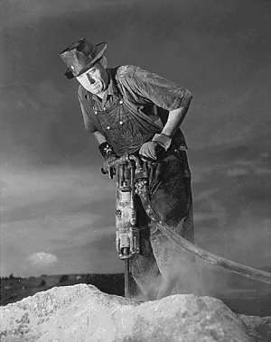 Tennessee Valley Authority Douglas Dam French Broad River Sevier County TN man with jackhammer 1942.gif