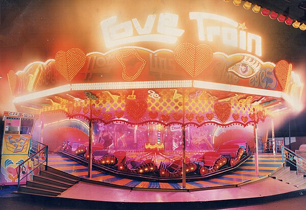 The Love Train is an example of the Music Express ride when lit at night.