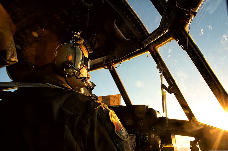 File:U.S. Air Force Capt. Chance Hansen, a C-130 Hercules aircraft pilot with the 36th Airlift Squadron, visually locates another C-130 over Japan Oct. 22, 2013, during a large-formation flight 131022-F-PM645-398.jpg