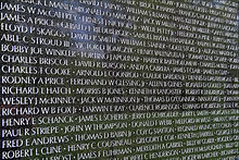 A small segment of the "Wall" at the Vietnam Veterans Memorial listing the names of the nearly 60,000 American war dead USA-Vietnam Veterans Memorial.JPG