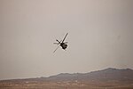 Thumbnail for File:USAF HH-60G Banking Combined Arms Demo.jpg