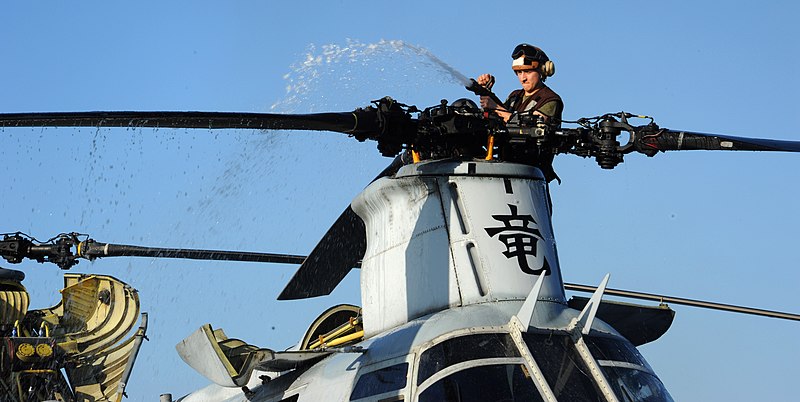 File:US Navy 120207-N-LP801-012 A Marine washes the rotors of a helicopter prior to flight.jpg